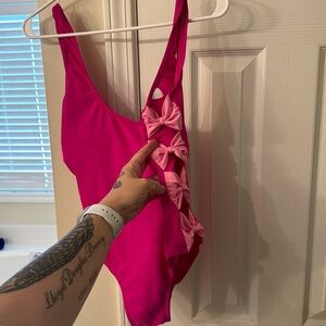 Bow sides full piece bathing suit